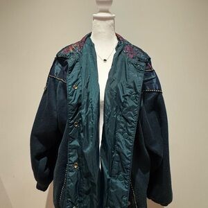 Women’s green jacket with floral design and gold beading